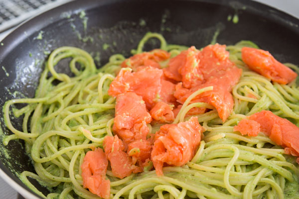 Spaghetti and smoked salmon tossed with a simple basil cream sauce.