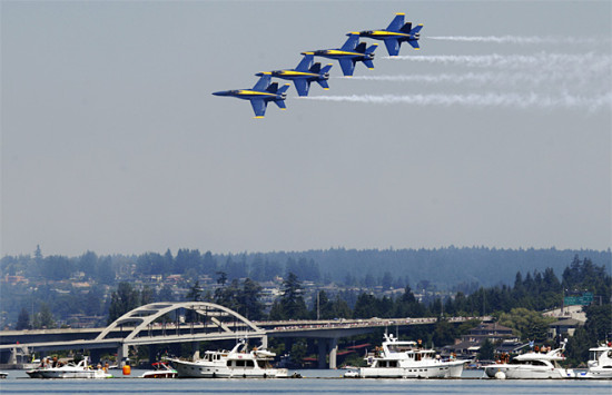 The United States Navy Blue Angels perform, Sunday, Aug. 5, 2012, at the Seafair Airshow in Seattle. (AP Photo/Ted S. Warren)