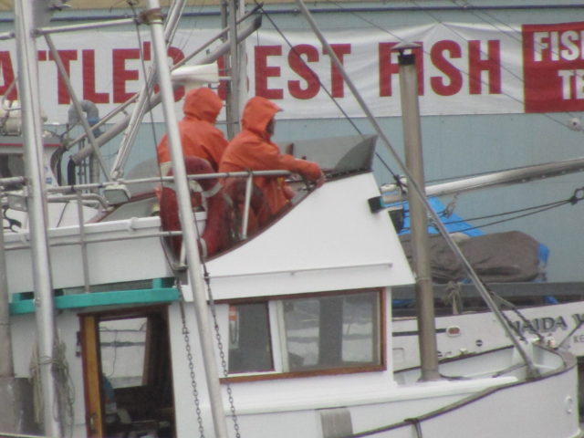 Seattle Fishermen in Full Rain Gear, Fall Fishing Extra Wet This Season At Sea, Puget Sound Fall Fishing