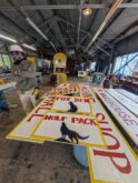 Workshop with Fox Den and Wolf Pack signs